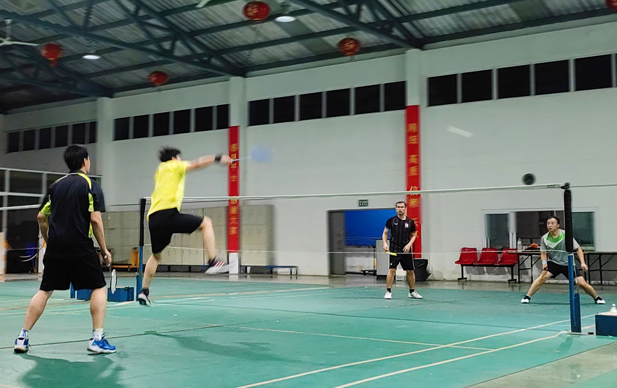 Weekly badminton match with customers